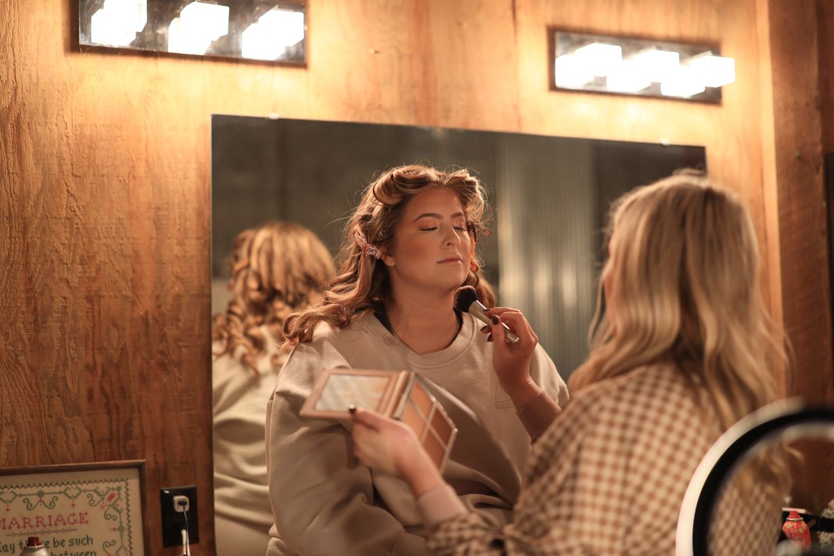 Rebecca getting her makeup done