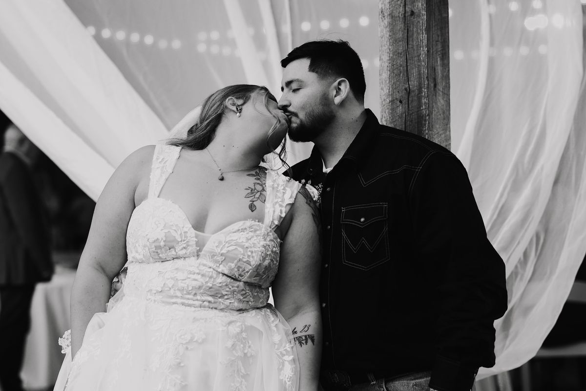Knox and Rebecca kissing, black and white